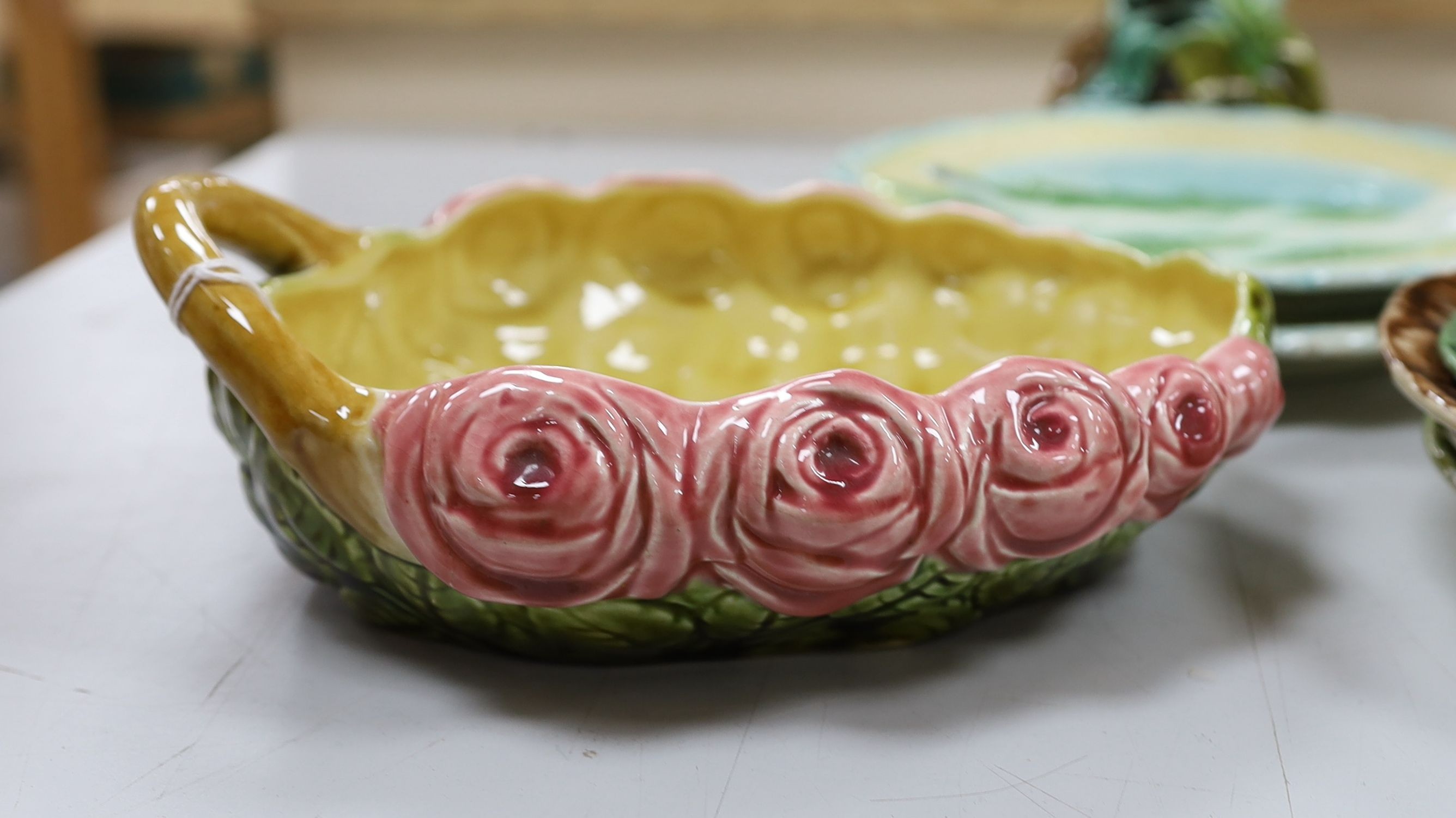 Two pairs of majolica dishes, three others, posy vase